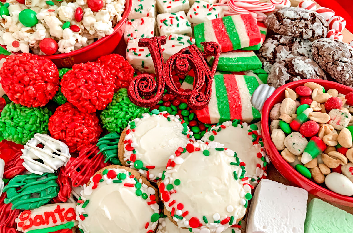 Closeup on a Christmas Dessert Board filled with Holiday cookies, candies and treats.