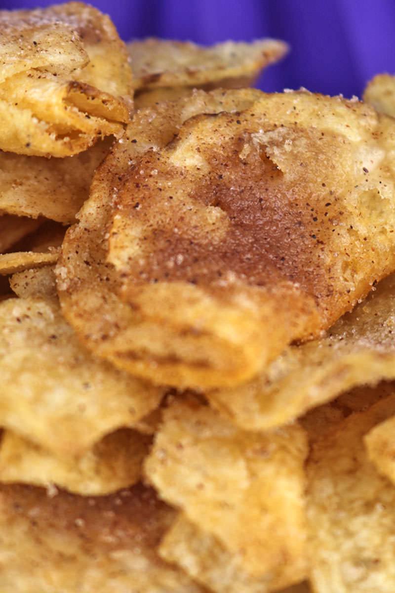Churro Chips - turn a bag of Kettle Chips into a super easy to make sweet and salty snack that tastes just like a churro. Your family will beg you to make this yummy homemade churros treat again and again. If you love Churros you are going to love this twist on a classic made with a bag of potato chips and some cinnamon sugar. Pin this easy sweet treat for later and follow us for more family snack ideas. #Churros #HomemadeChurros #KettleChips #SweetandSalty