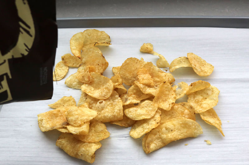 Pour chips onto a cookie sheet