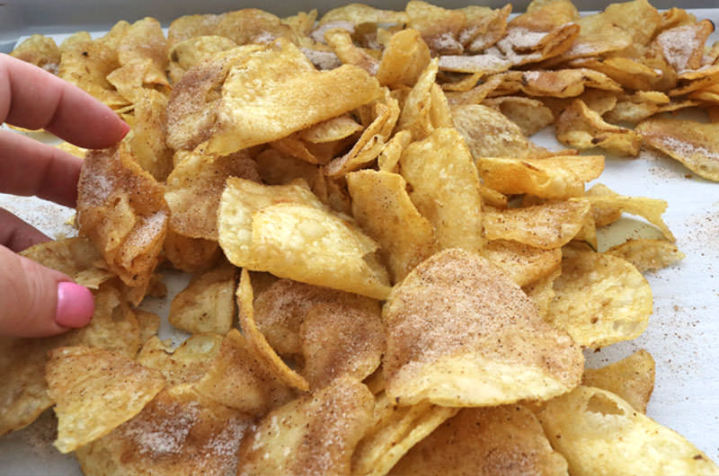 Toss the chips to cover with the cinnamon sugar
