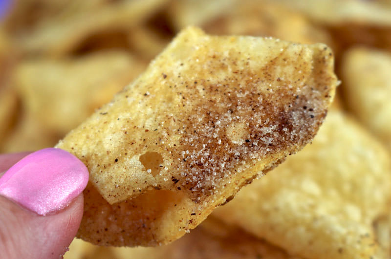 Churro Chips - turn a bag of Kettle Chips into a super easy to make sweet and salty snack that tastes just like a churro. Your family will beg you to make this yummy homemade churros treat again and again. If you love Churros you are going to love this twist on a classic made with a bag of potato chips and some cinnamon sugar. Pin this easy sweet treat for later and follow us for more family snack ideas. #Churros #HomemadeChurros #KettleChips #SweetandSalty