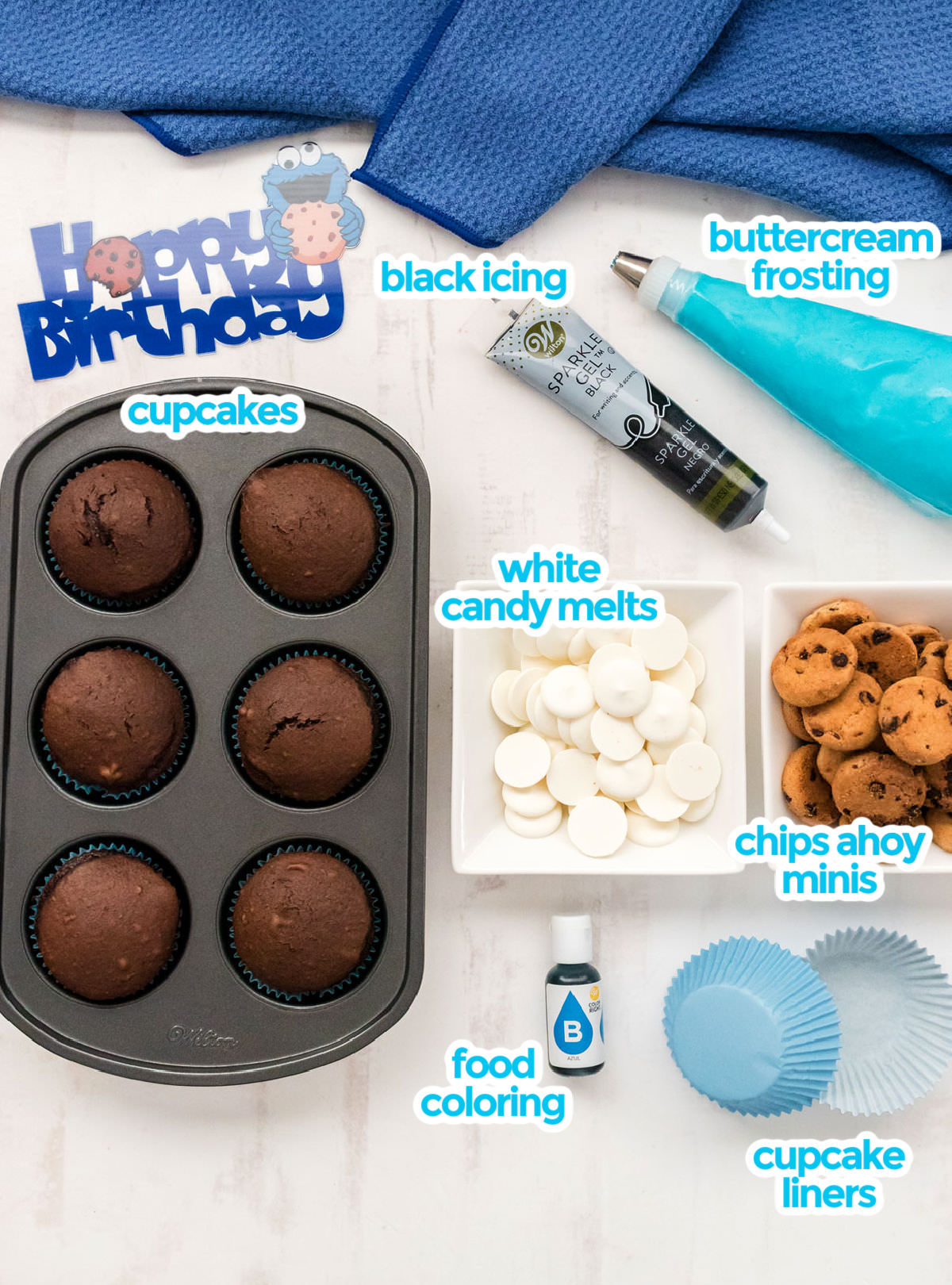 All the ingredients you will need to make Cookie Monster Cupcakes including cupcakes, buttercream frosting, black icing, candy melts, mini Chips Ahoy cookies, food coloring and cupcake liners.