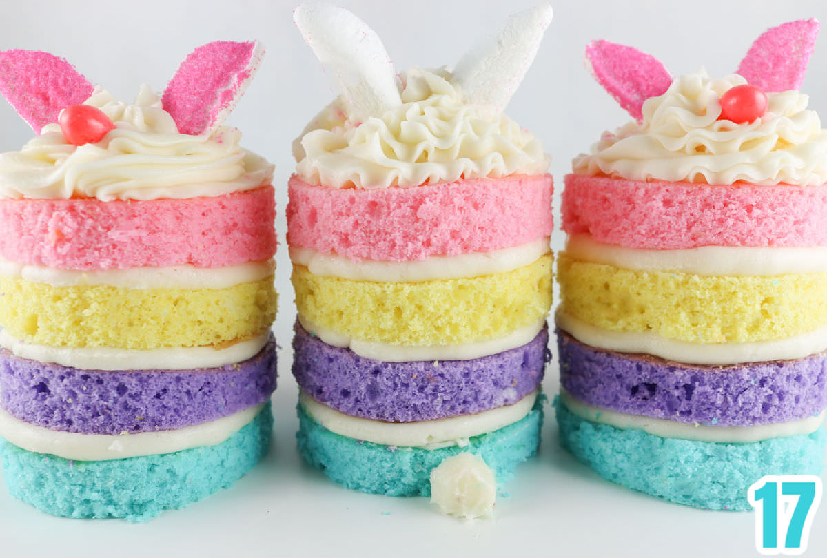 Closeup on three Easter Bunny Mini Cakes, once turned around to show the frosting bunny tail!