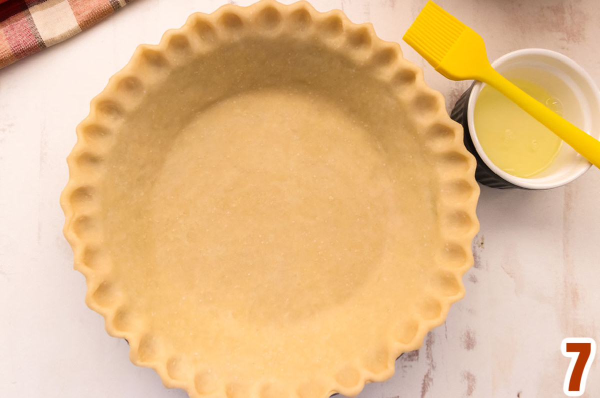 Closeup image of a single pie crust with no pie filling.