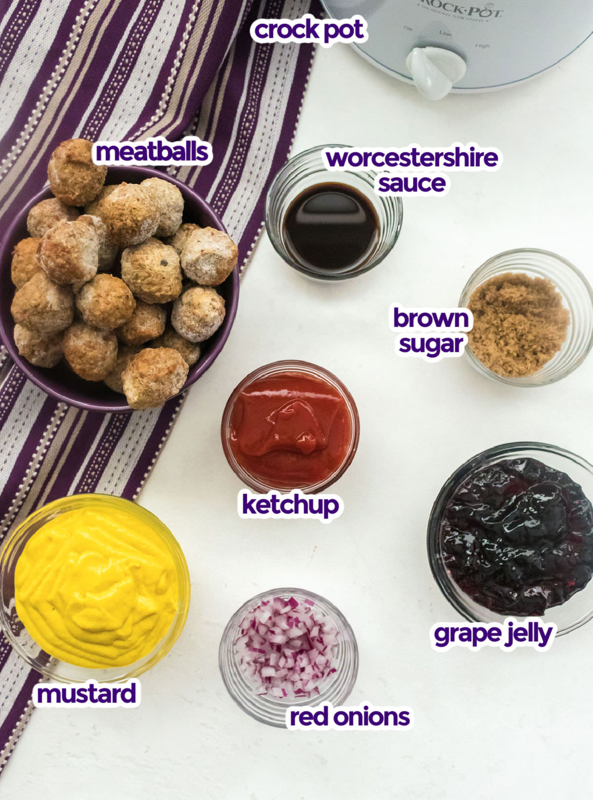 All the ingredients you will need to make Grape Jelly Meatballs including frozen meatballs, Worcestershire Sauce, Brown Sugar, Ketchup, Mustard, Red Onion and Grape Jelly.
