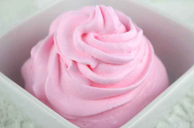 We have all the directions you'll need to make pretty and delicious homemade Colored Whipped Cream. It could not be easier to make and this colored whipping cream will look so special and pretty on your desserts. Pin this homemade whipped cream recipe for later and follow us for more great baking tips ideas. #whippedcream #coloredwhippedcream #whippedcreamdesserts