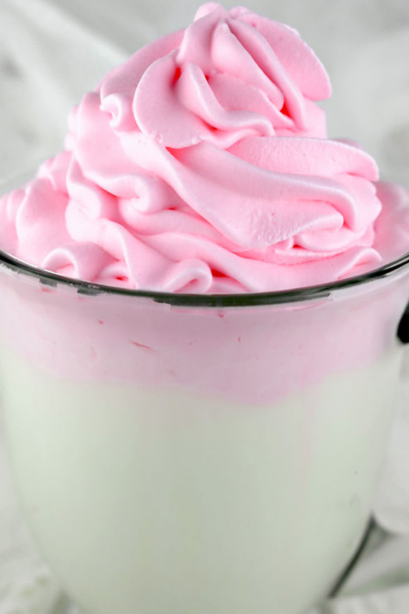 We have all the directions you'll need to make pretty and delicious homemade Colored Whipped Cream. It could not be easier to make and this colored whipping cream will look so special and pretty on your desserts. Pin this homemade whipped cream recipe for later and follow us for more great baking tips ideas. #whippedcream #coloredwhippedcream #whippedcreamdesserts