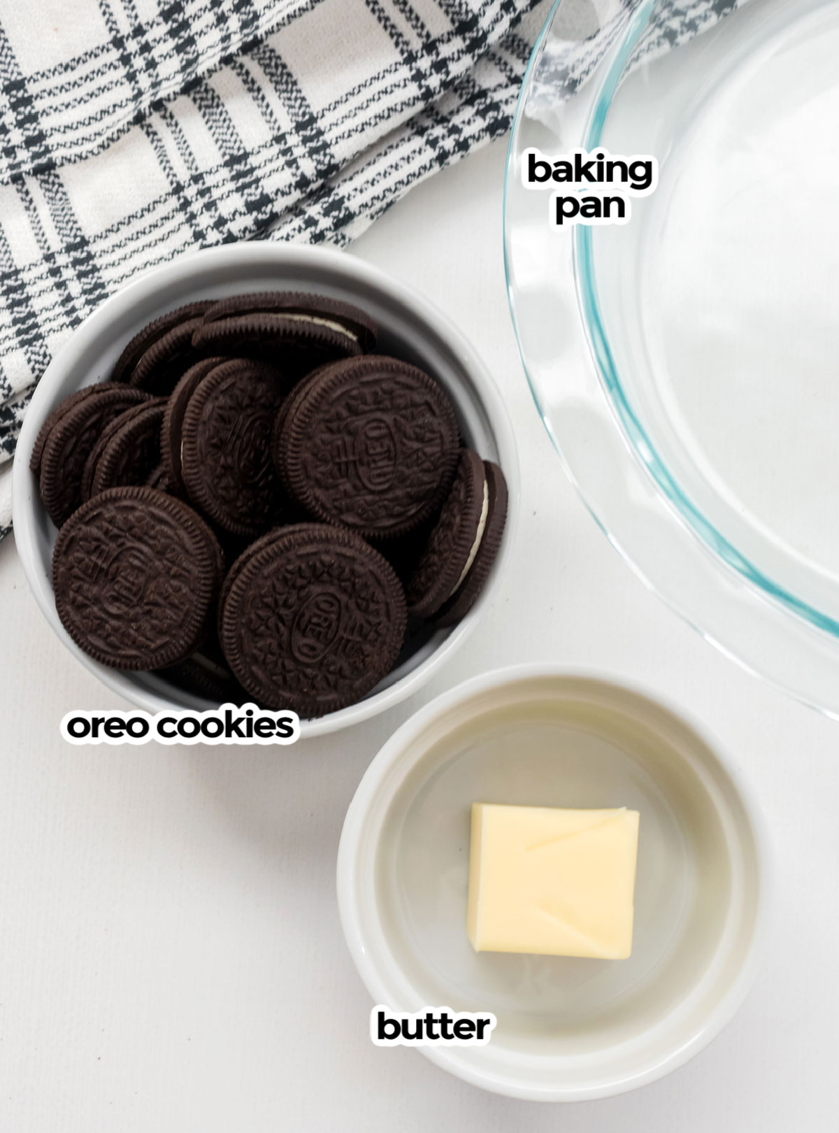 All the ingredients you will need to learn how to make Oreo Crusts including a pie pan, Oreo Cookies and Melted Butter.