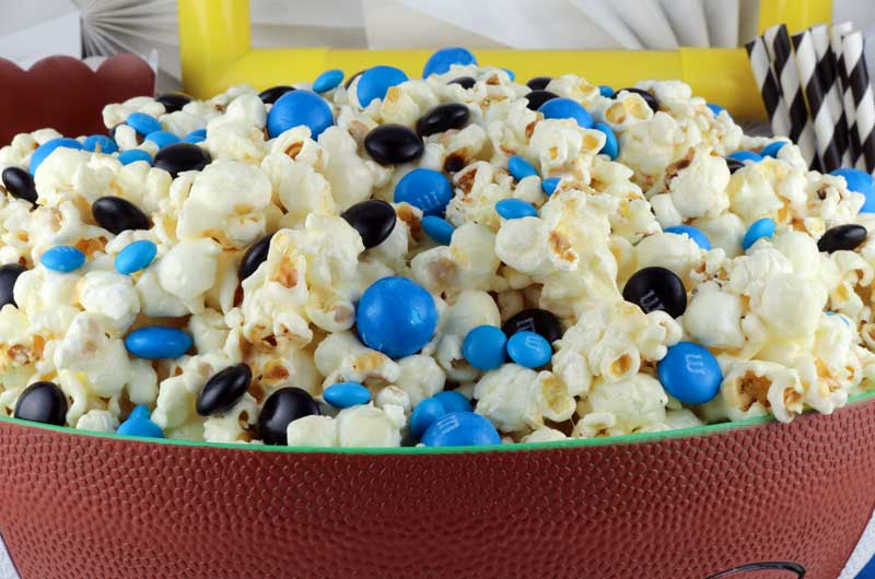 Jacksonville Jaguars Popcorn for those Jacksonville Jaguars fans in your life. Sweet, salty, crunchy and delicious and it is extremely easy to make. This delicious popcorn will be perfect at your next game day football party. a NFL playoff party or a Super Bowl party. Follow us for more fun Super Bowl Food Ideas. #jacksonvillejaguars #jaguars #superbowl #superbowlparty #superbowlfood #jacksonvillejaguarsfood