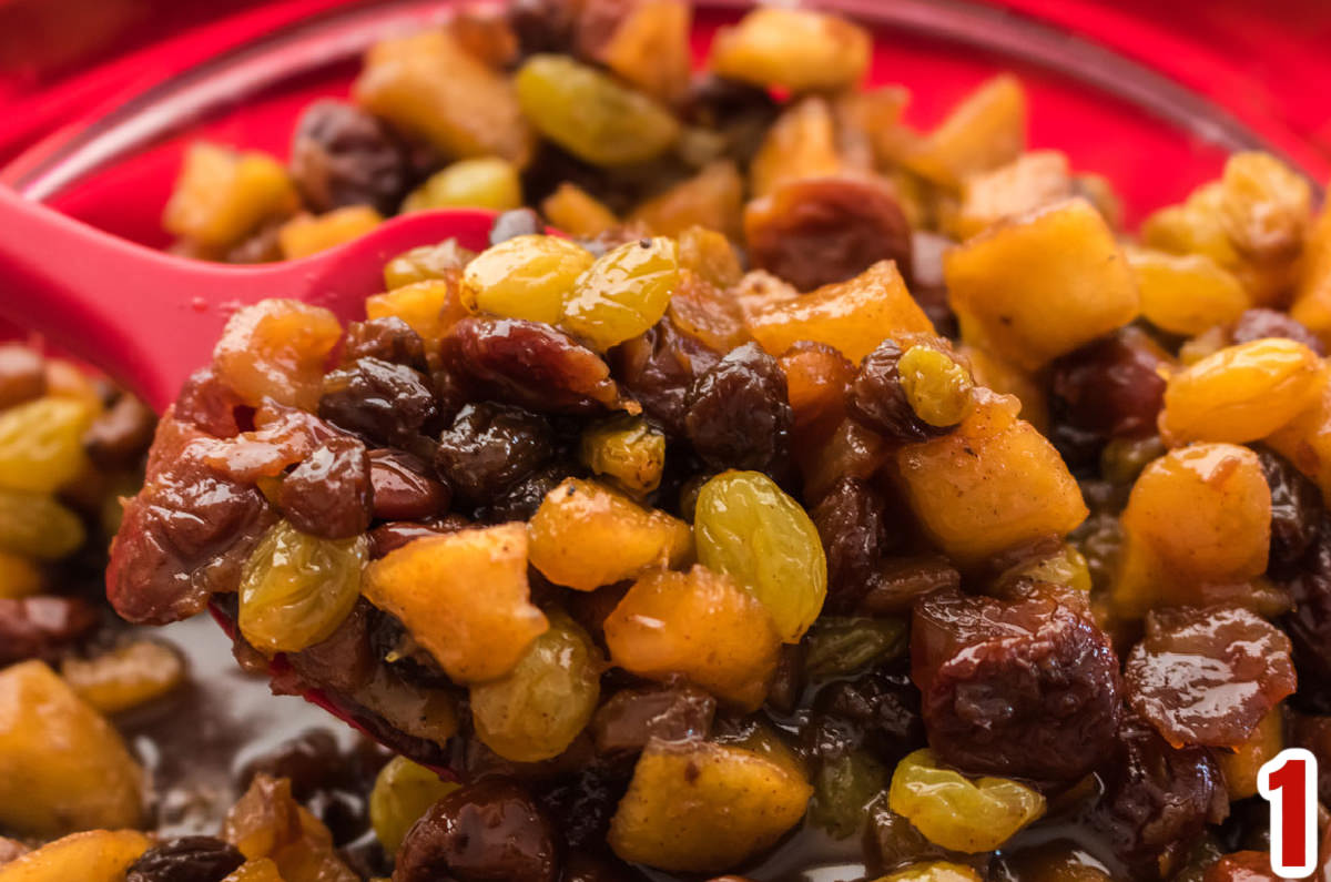 Closeup on a glass bowl filled with Homemade Mincemeat.