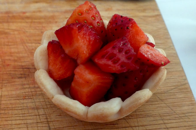 Add strawberries to pie shell