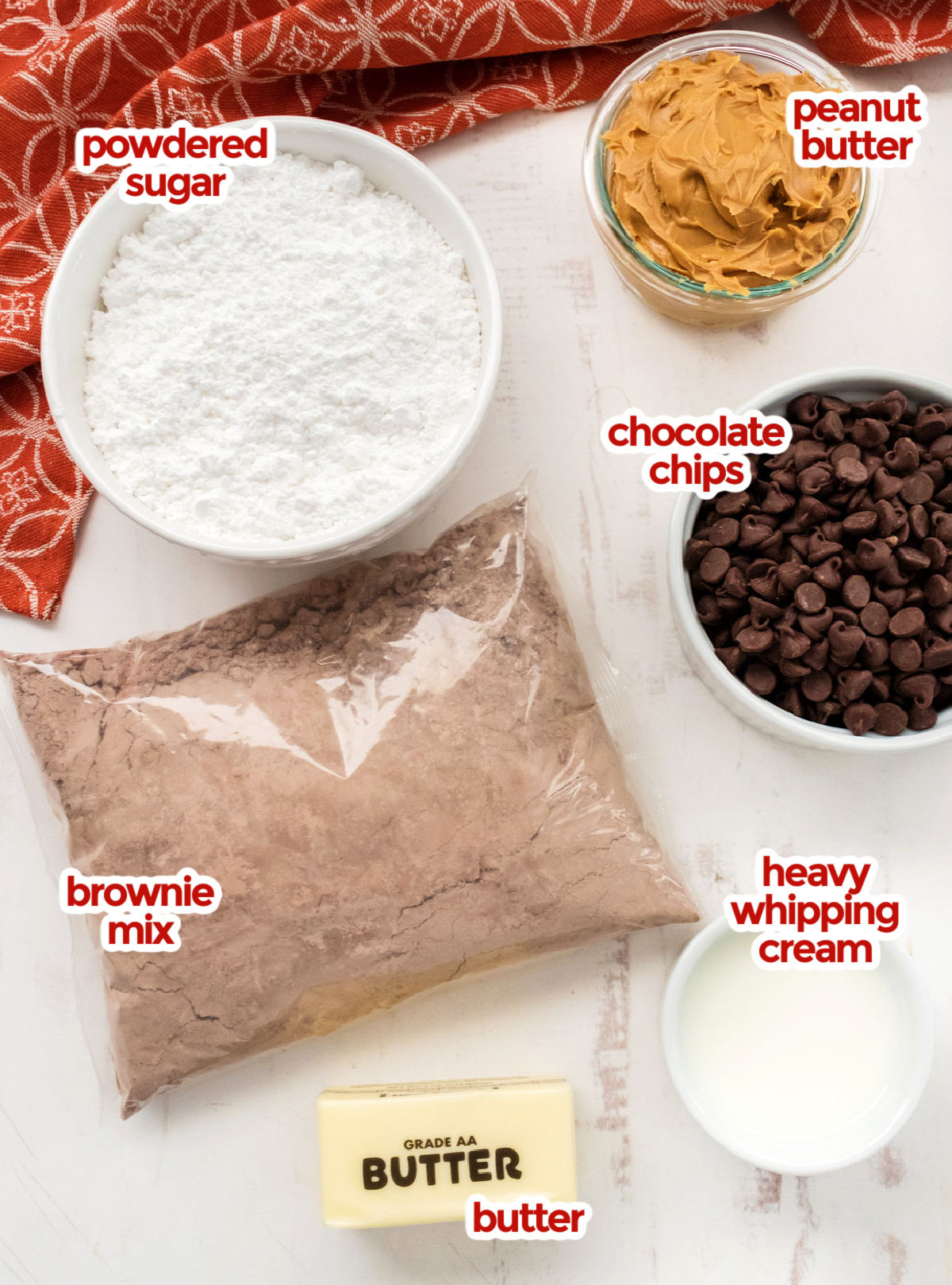 All the ingredients you will need to make Peanut Butter Swirl Brownies including Brownie Mix, Peanut Butter, Powdered Sugar, Butter, Heavy Whipping Cream and Chocolate Chips.