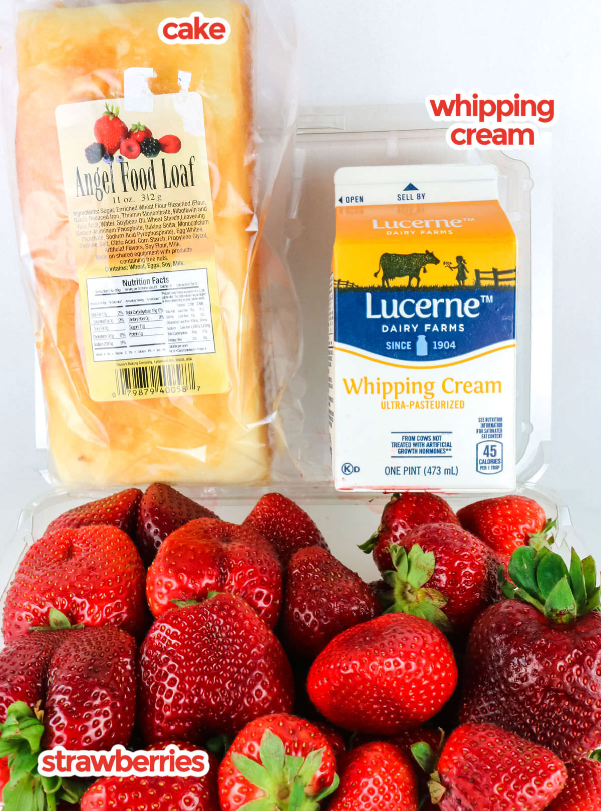 Ingredients you will need to make Red White and Blue Strawberry Shortcake including fresh strawberries, angel food cake and whipping cream.