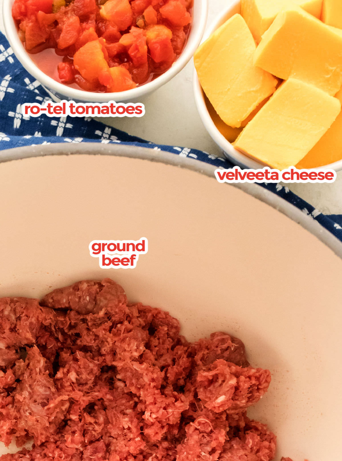 Ingredients needed to make Rotel Dip including Ground Beef, Velveeta Cheese, and Ro-Tel Tomatoes.