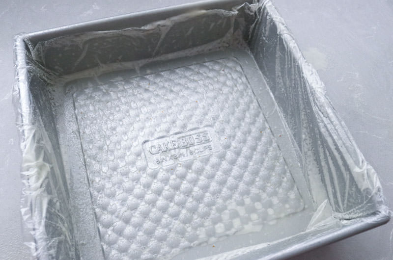 Square baking pan prepared for Marshmallow mixture