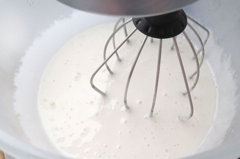 Mixing bowl with gelatin mixture and simple syrup