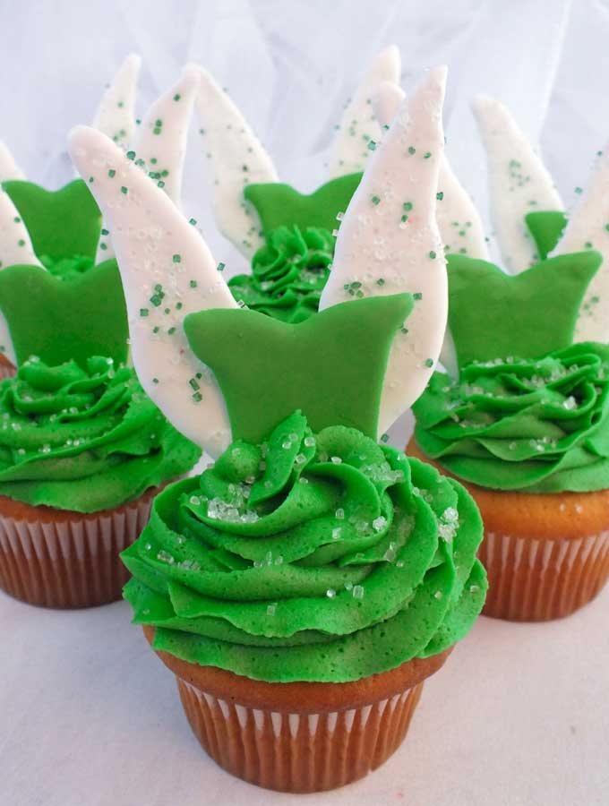 Tinkerbell Cupcakes - so cute and so delicious. Clap if you believe! We have all the directions to make these adorable Disney Tinker Bell Cupcakes that are perfect for a Tinkerbell Birthday Party. Follow us for more great Tinkerbell Party Ideas.